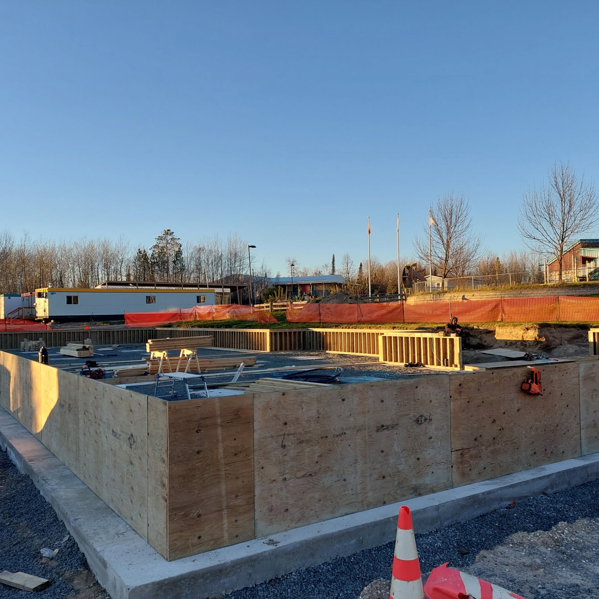 Upper framing with telehandler and crew